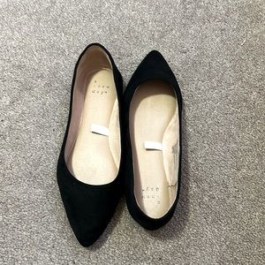 black pointed flats